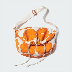 Marimekko Orange and White Floral drawstring bag - Uniqlo